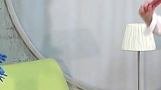 College Girl's Game of Hitting Clothespins with a Whip to Remove Them