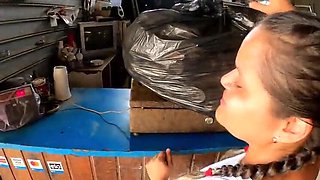 Homeless lady exposés her chest for canned goods